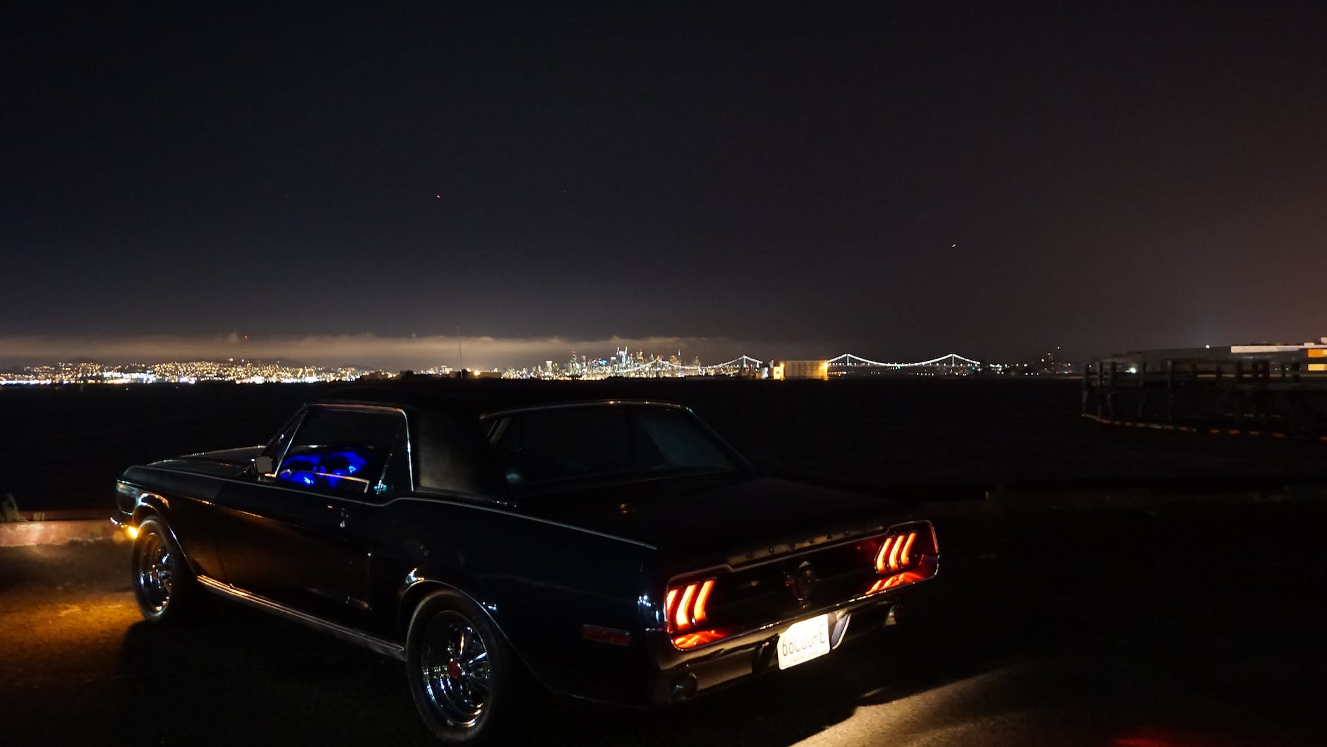 black coupe during evening